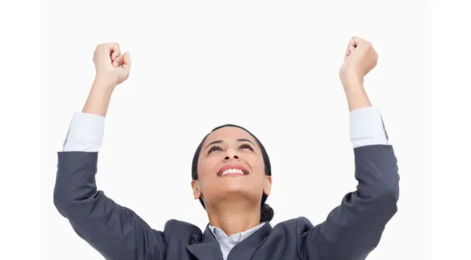 A team celebrating a process improvement result