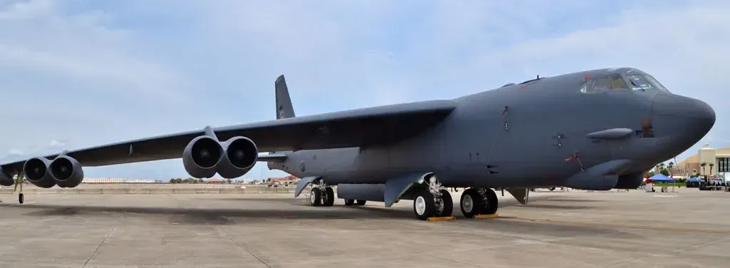 A B-52 bomber positioned and ready for aerial refueling