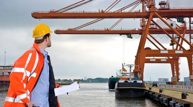 A reflective, high-visibility safety garment reviewed against the process model