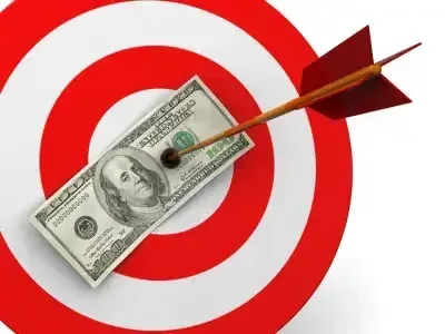 Hitting the mark with process improvement, money balanced on a dartboard