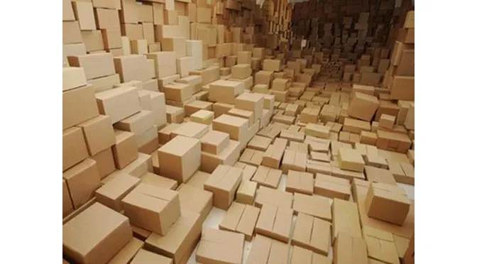 Stacks of finished product boxes representing high-volume production runs